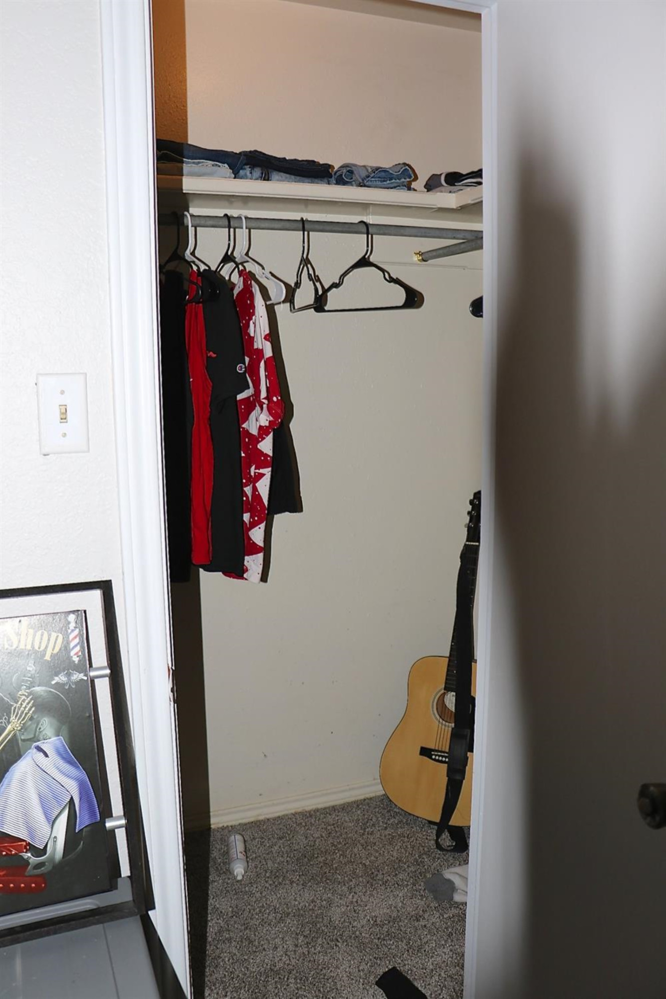 7004 Elkhart Avenue Lubbock, TX 79424 - Photo 30 of 44 a view of walk in closet with clothes and shoes