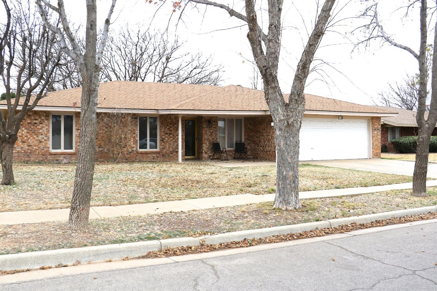 7004 Elkhart Avenue Lubbock, TX 79424 - Photo 44 of 44 front view of a house with a trees