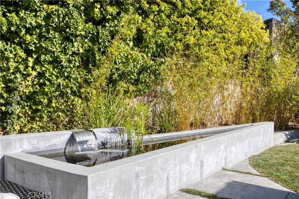 1652 Encino Court San Luis Obispo, CA 93401 - Photo 42 of 45 Tranquil fountain and fish pond.