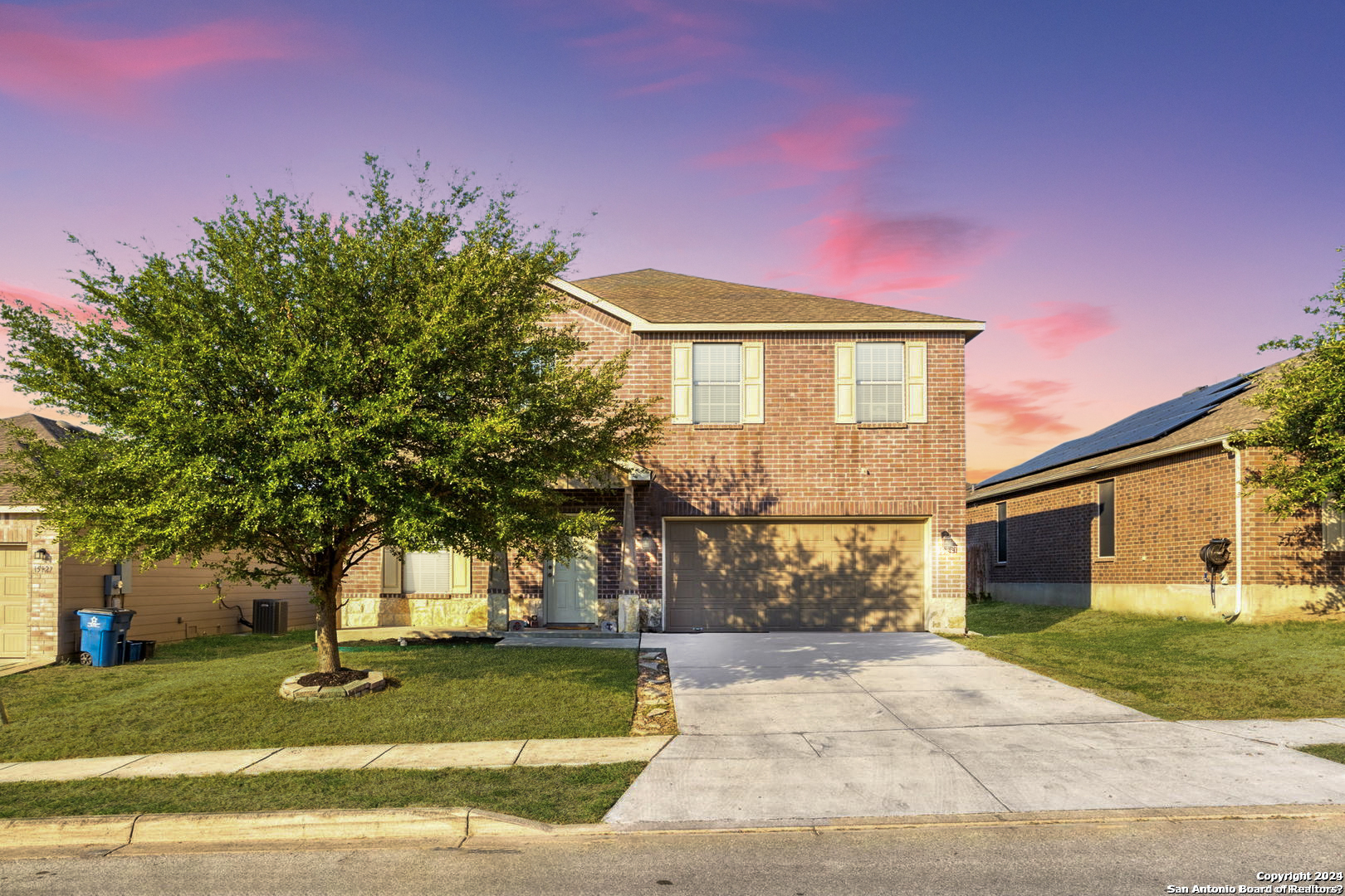 15931 Silver Rose Selma, TX 78154 - Photo 1 of 1 a front view of a house with a yard and a garage