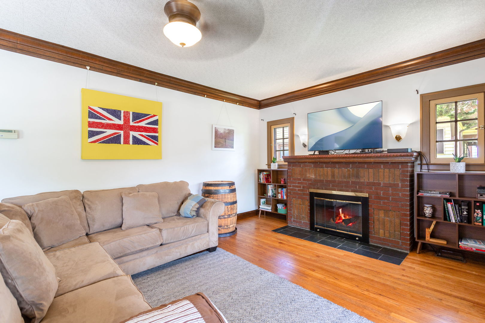 342 Lawton Road Riverside, IL 60546 - Photo 3 of 33 a living room with furniture and a fireplace