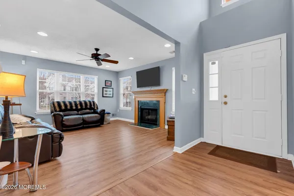 a kitchen with stainless steel appliances granite countertop a stove sink and cabinets