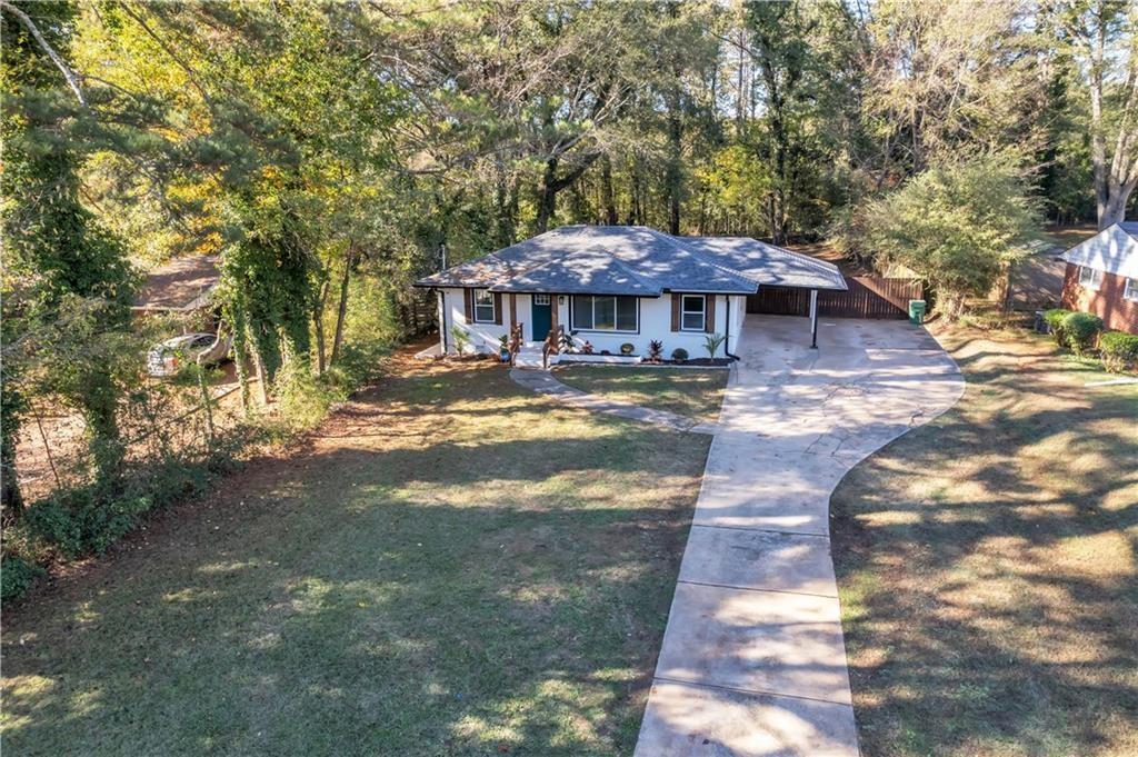2358 Tilson Road Decatur, GA 30032 - Photo 14 of 14 a view of a house with a yard