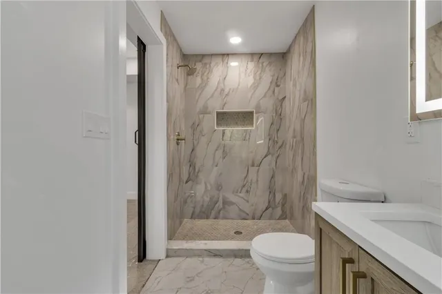 a view of a window with a tree in front of it