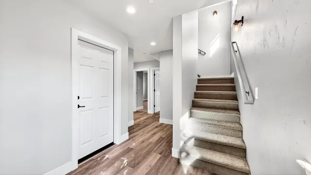 a view of a bathroom with wooden floor
