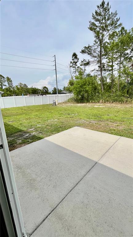 13486 English Sparrow Road Weeki Wachee, FL 34614 - Photo 36 of 51 a view of a lake with a big yard