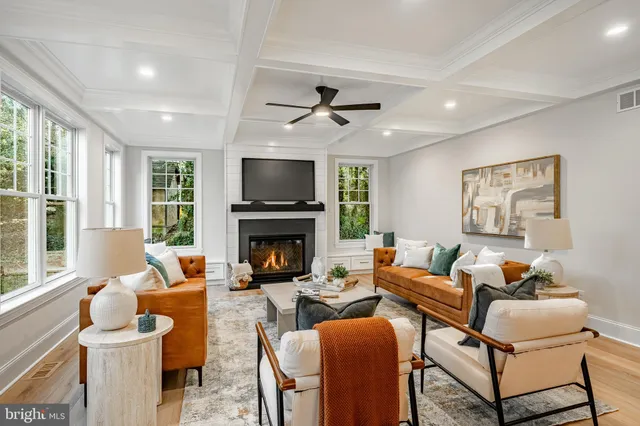 a bathroom with a double vanity sink toilet mirror and shower