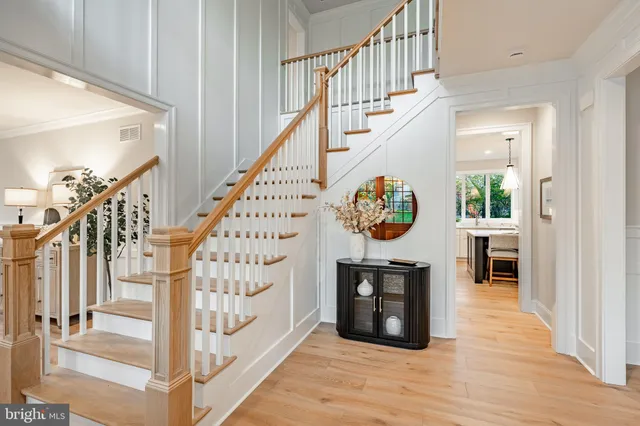 a kitchen with a sink cabinets and appliances