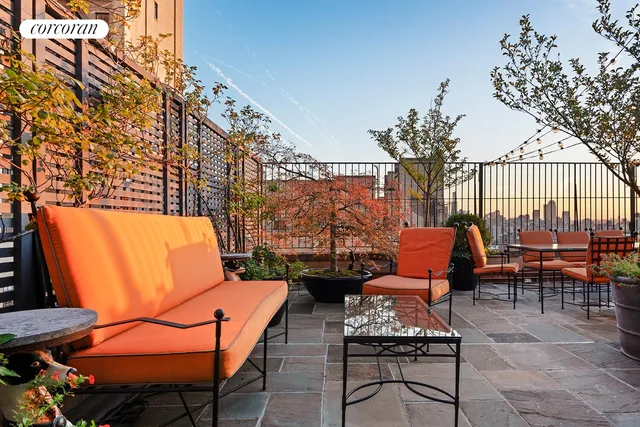 a outdoor living space with furniture and a potted plant