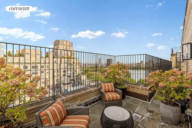 a view of balcony with a potted plant
