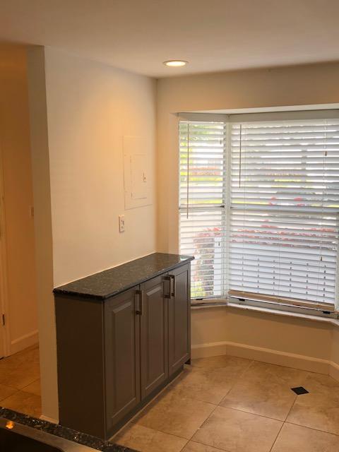 1072 Jeffery Street Boca Raton, FL 33487 - Photo 17 of 38 a bathroom with a bathtub and a sink