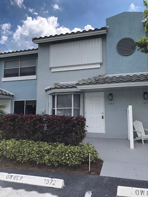 1072 Jeffery Street Boca Raton, FL 33487 - Photo 25 of 38 a house view with a outdoor space