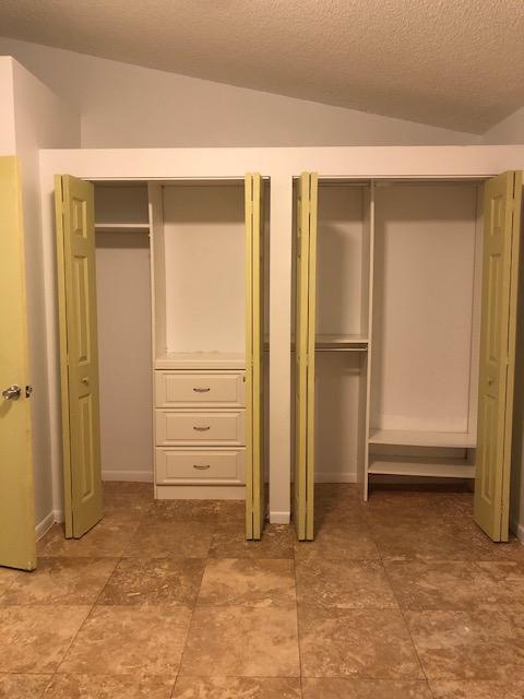 1072 Jeffery Street Boca Raton, FL 33487 - Photo 30 of 38 an empty room with closet
