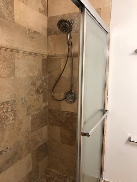 1072 Jeffery Street Boca Raton, FL 33487 - Photo 33 of 38 a bathroom with a shower