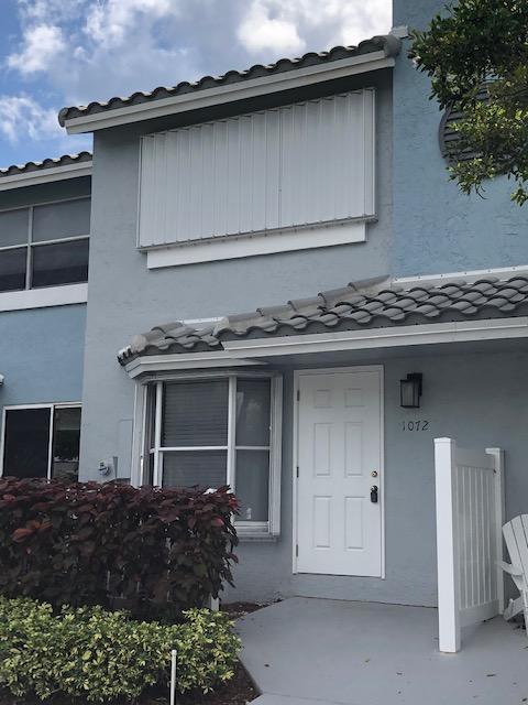 1072 Jeffery Street Boca Raton, FL 33487 - Photo 6 of 38 a front view of house