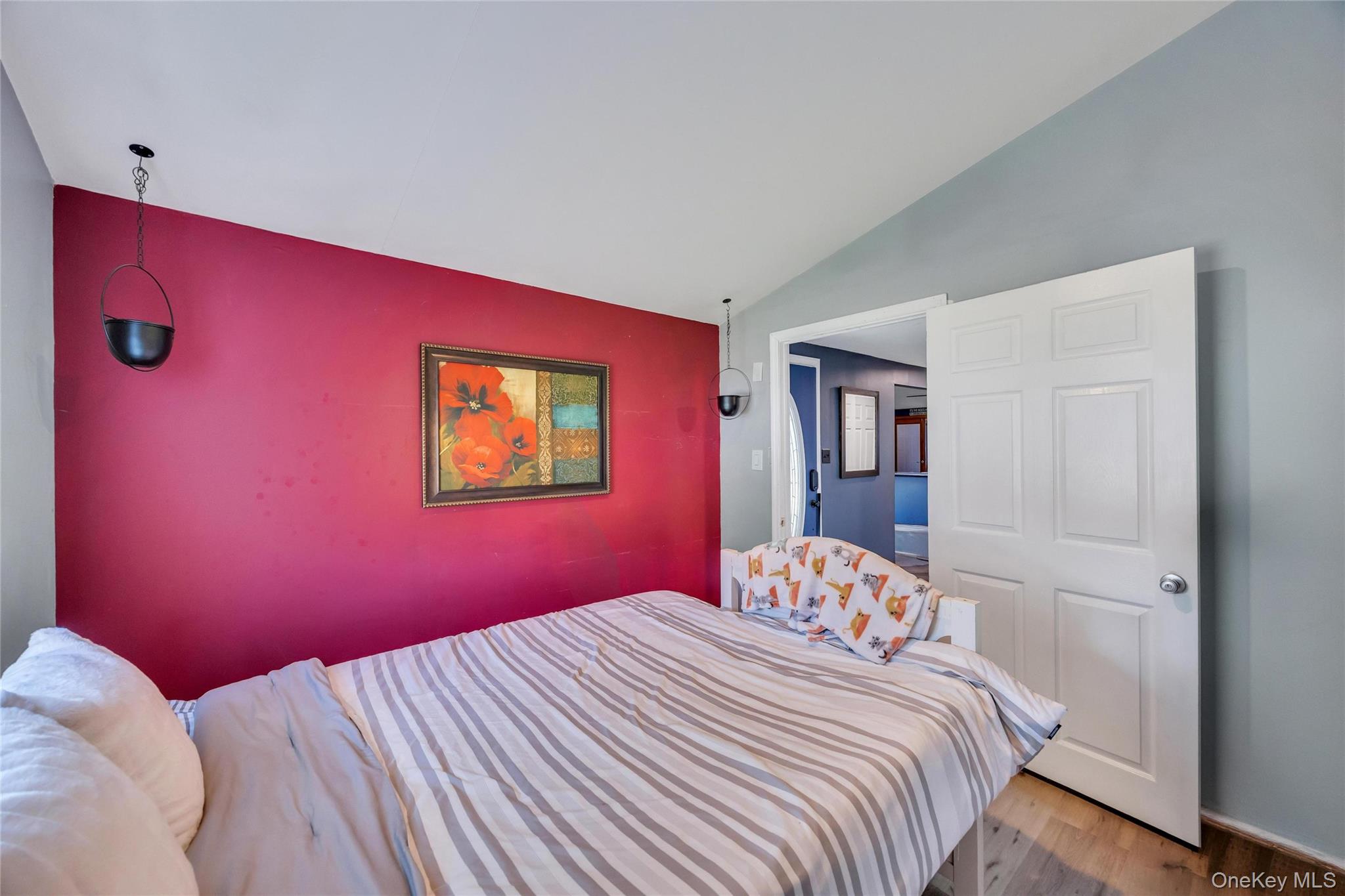 7 Amherst Road Ronkonkoma, NY 11779 - Photo 25 of 36 a bedroom with a bed and a dresser