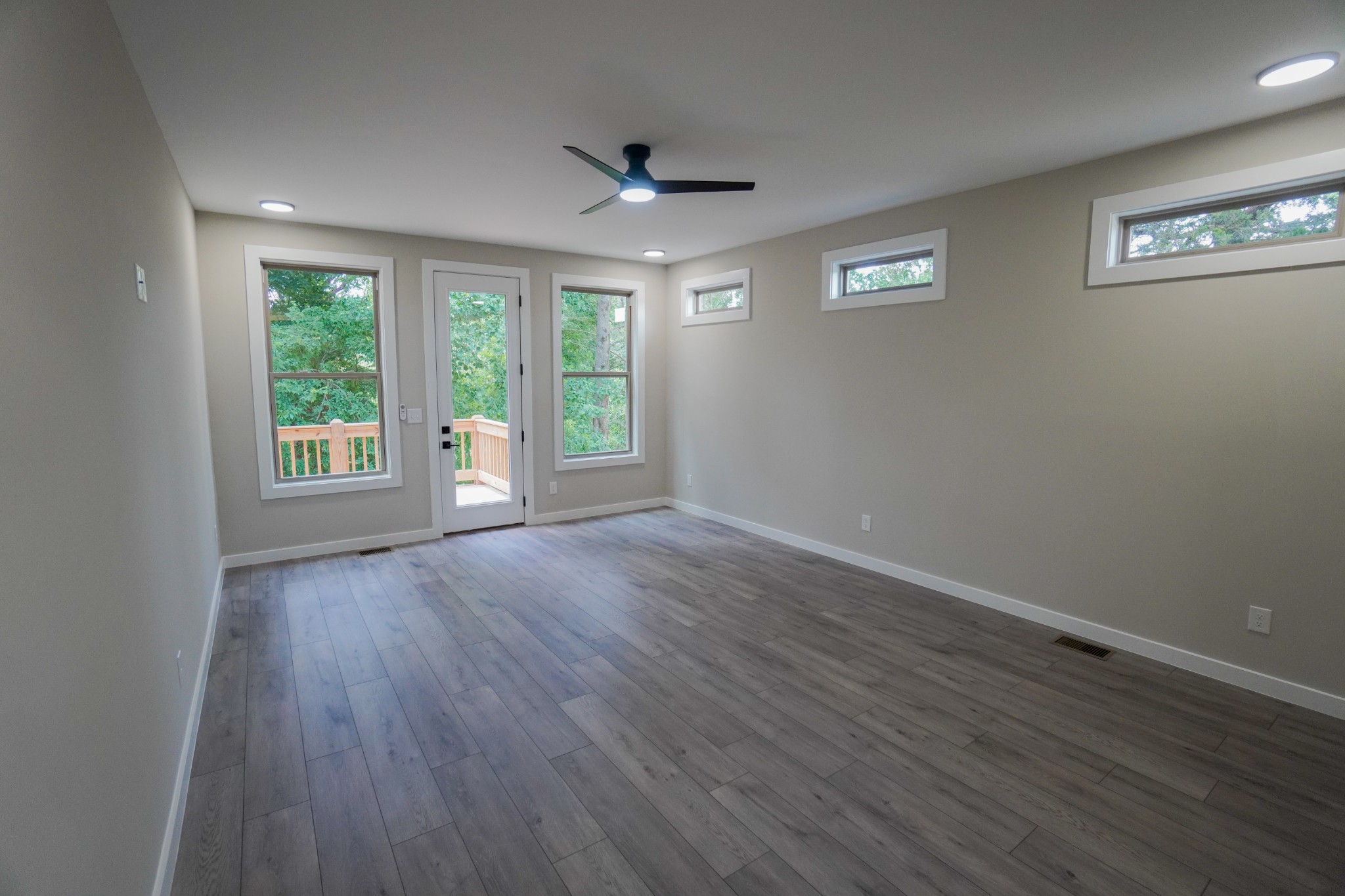 3001 Wixtown Road Westmoreland, TN 37186 - Photo 20 of 30 a view of an empty room with wooden floor and a window
