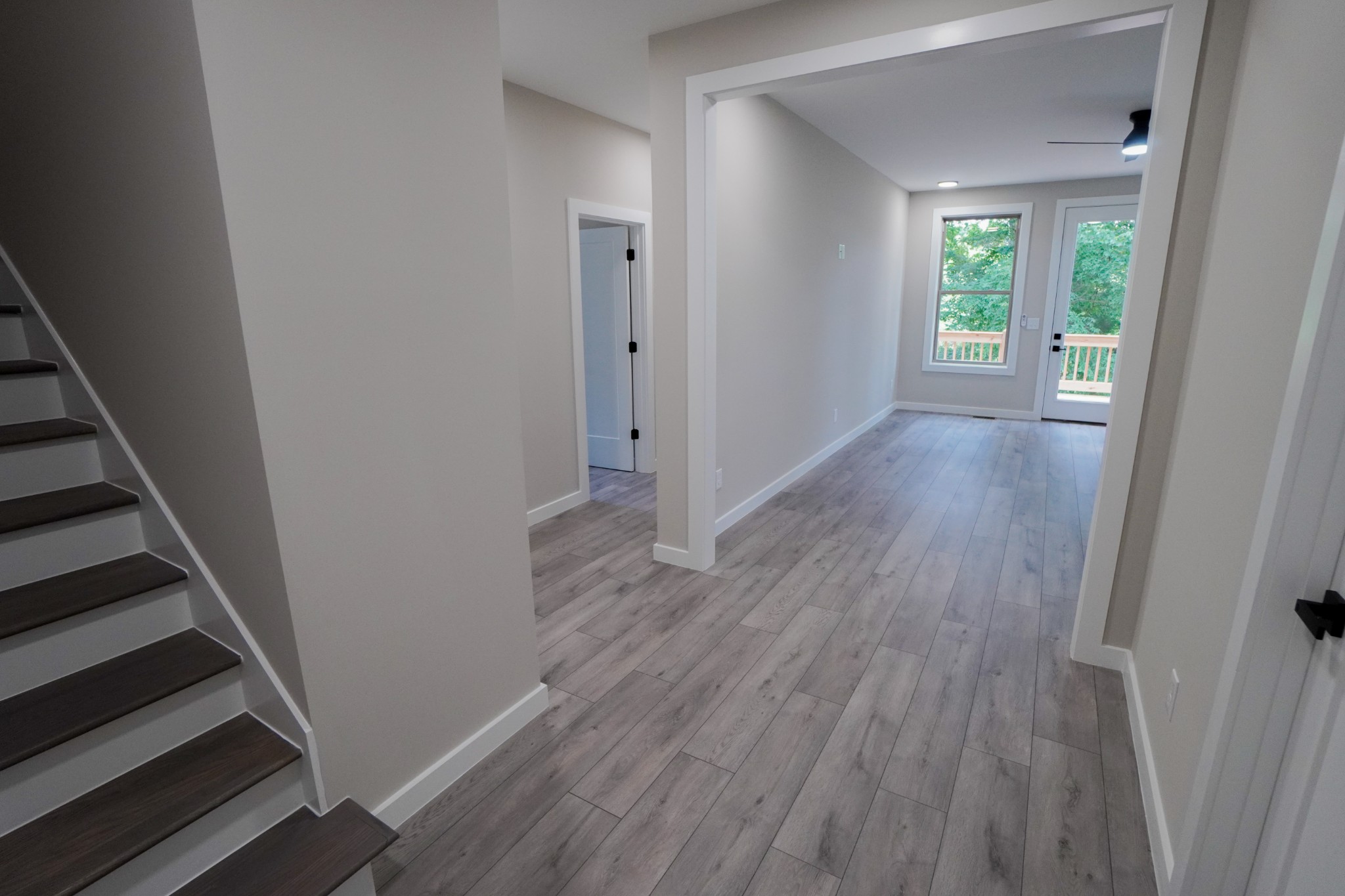 3001 Wixtown Road Westmoreland, TN 37186 - Photo 21 of 30 an empty room with wooden floor and windows