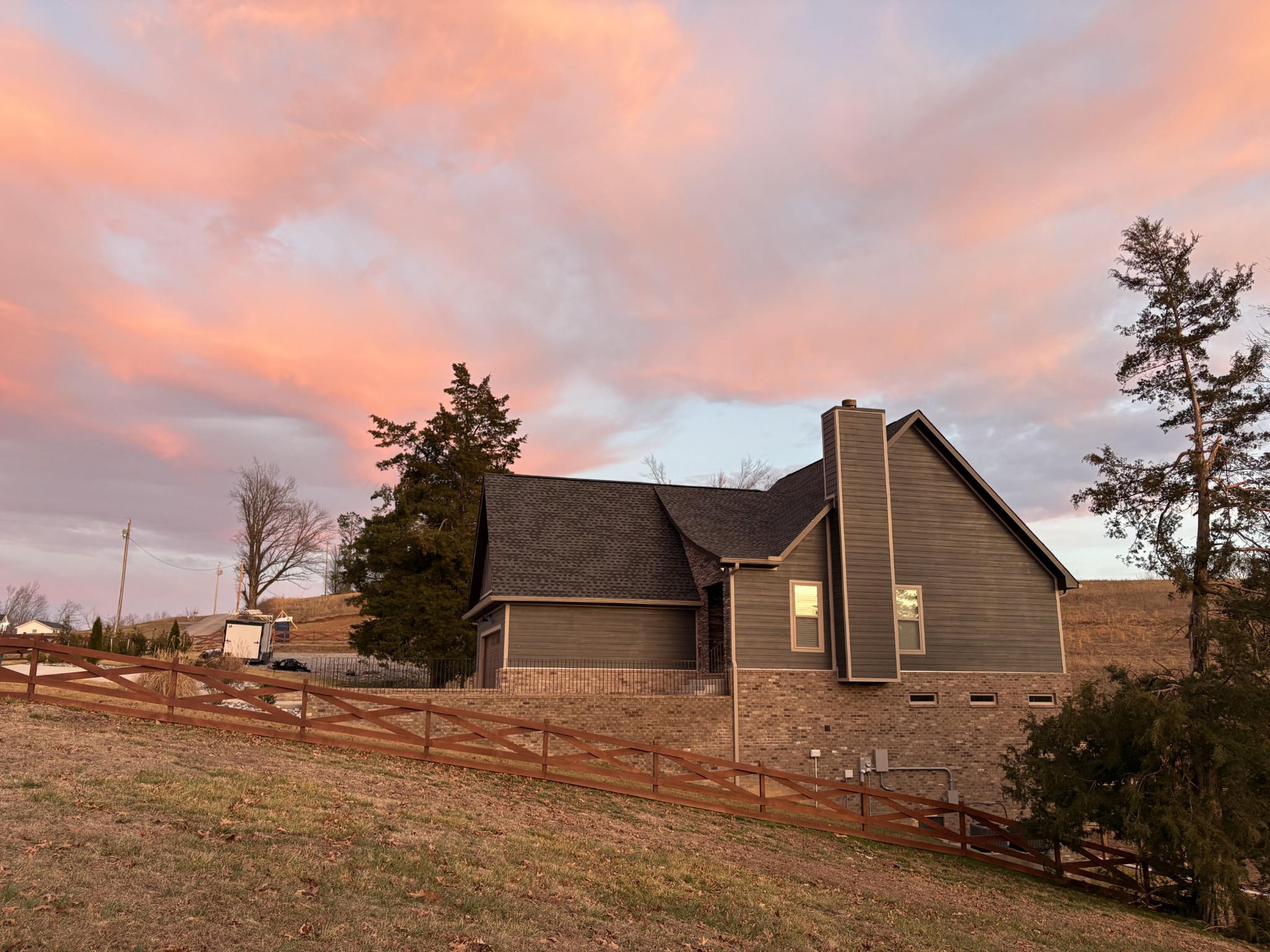 3001 Wixtown Road Westmoreland, TN 37186 - Photo 29 of 30 a front view of a house with a yard and garage