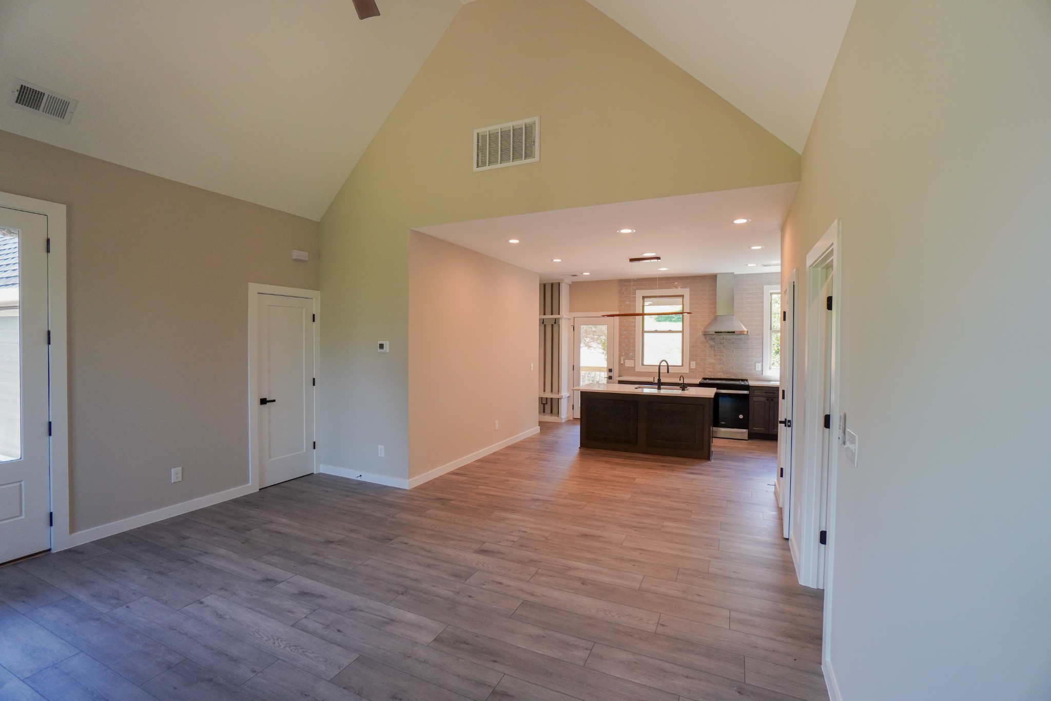 3001 Wixtown Road Westmoreland, TN 37186 - Photo 6 of 30 a view of a kitchen and a sink wooden floor and a window