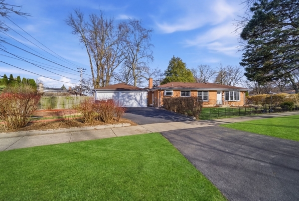 50 Glenview Road Glenview, IL 60025 - Photo 1 of 20 a view of yard with green space and porch
