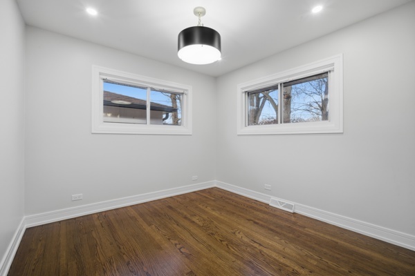 50 Glenview Road Glenview, IL 60025 - Photo 11 of 20 a view of an empty room with wooden floor and a window