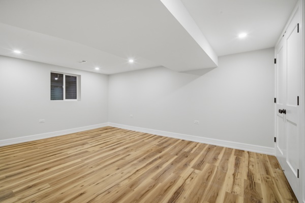 50 Glenview Road Glenview, IL 60025 - Photo 17 of 20 an empty room with wooden floor and windows