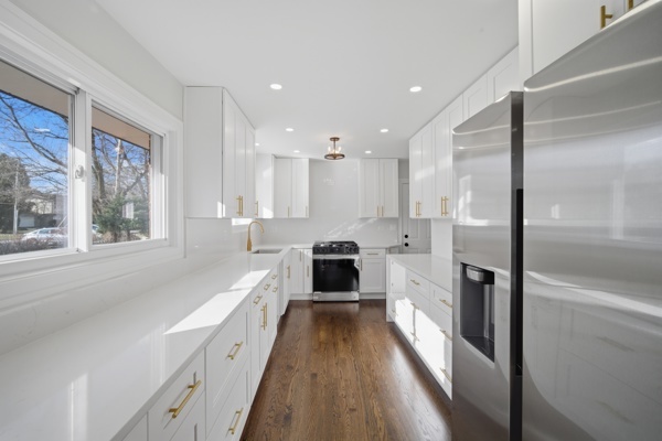 50 Glenview Road Glenview, IL 60025 - Photo 5 of 20 a large white kitchen with a large window