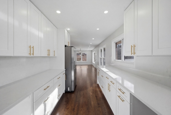 50 Glenview Road Glenview, IL 60025 - Photo 6 of 20 a large white kitchen with stainless steel appliances