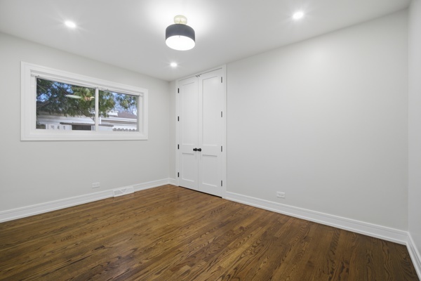 50 Glenview Road Glenview, IL 60025 - Photo 8 of 20 wooden floor in an empty room with a window