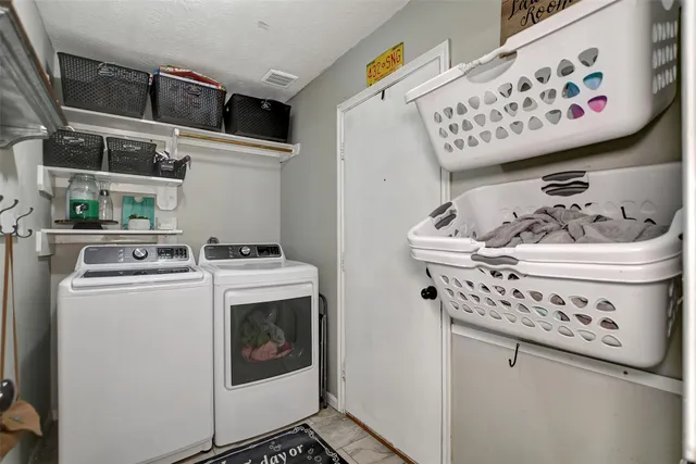 a view of a house with a yard porch and sitting area