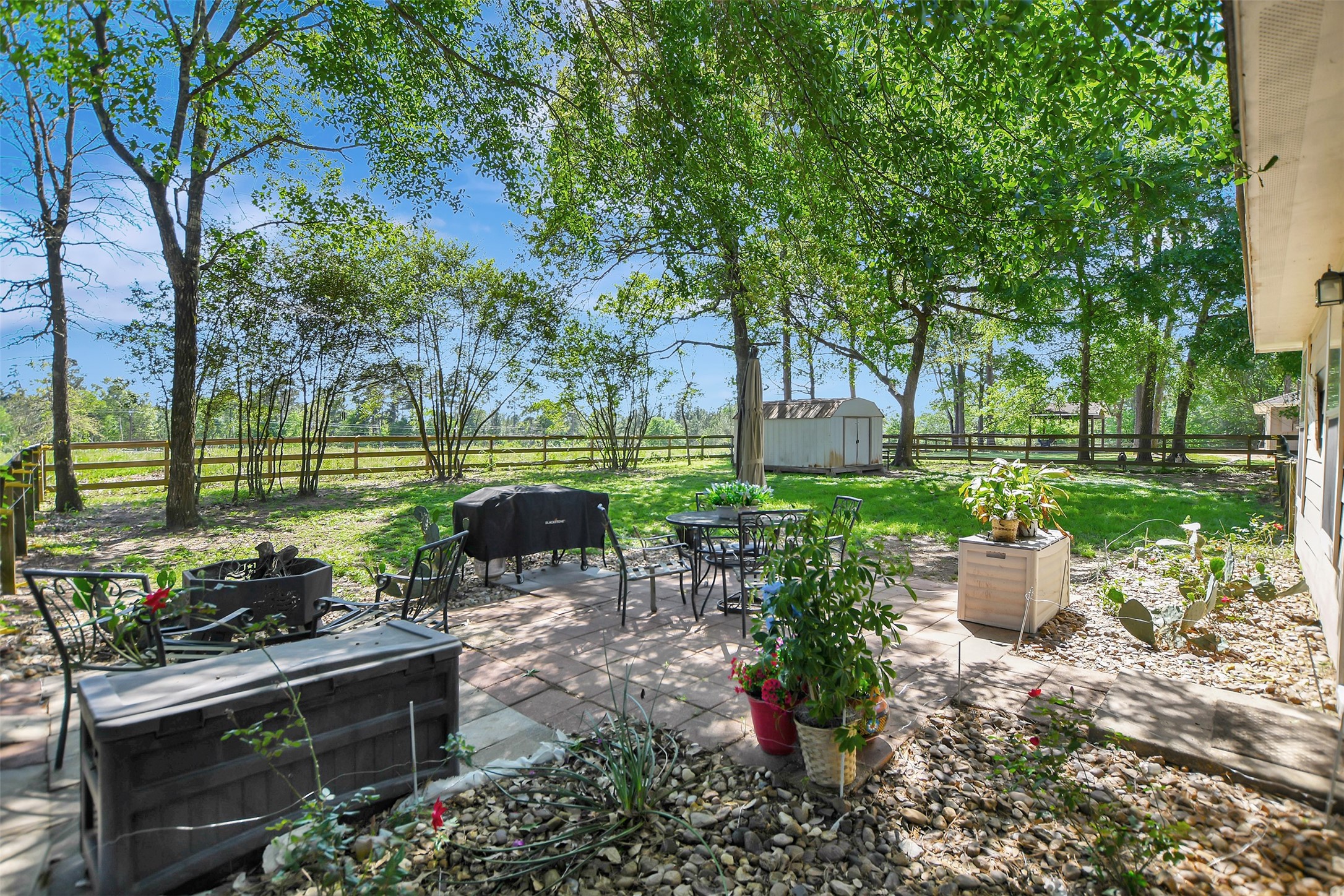 25401 Hunting Trail Magnolia, TX 77355 - Photo 35 of 50 a garden view with a seating space