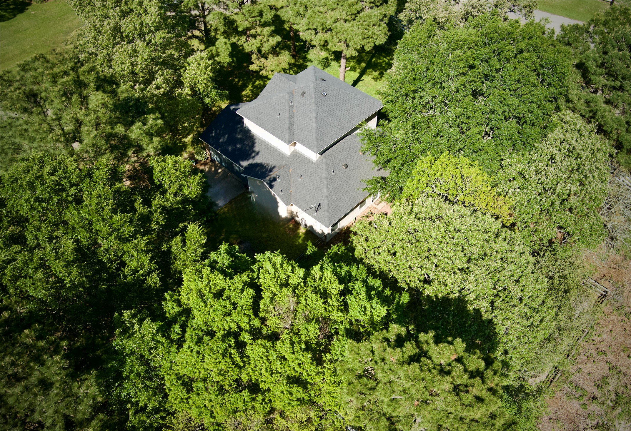 25401 Hunting Trail Magnolia, TX 77355 - Photo 45 of 50 an aerial view of a house with a yard and outdoor seating