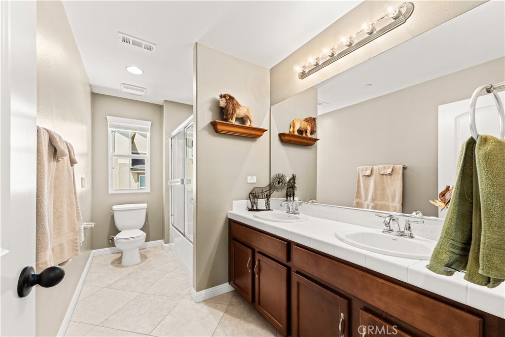 4976 Golden Ridge Place Rancho Cucamonga, CA 91739 - Photo 30 of 56 Upstairs shared full bathroom with shower tub combo