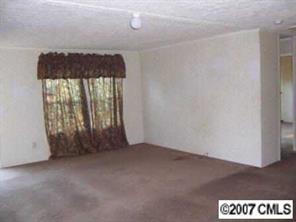 1655 Ruth Street Lancaster, SC 29720 - Photo 4 of 5 an empty room with a window