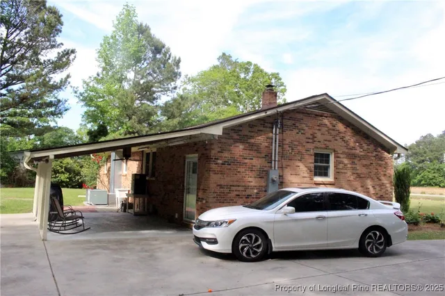 a car parked in front of a house
