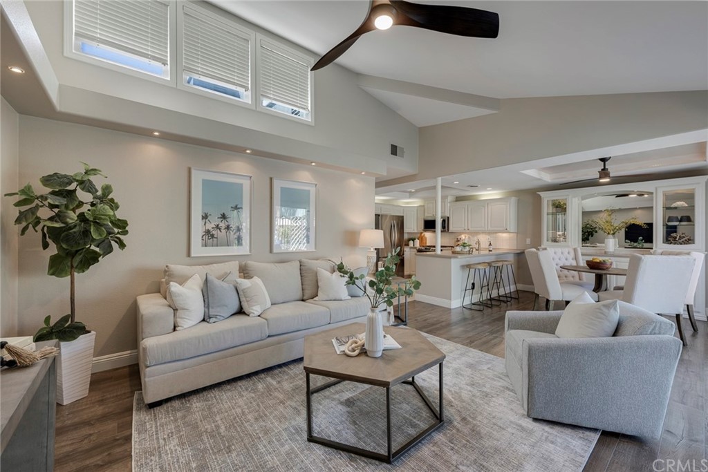 3424 Pinebrook Costa Mesa, CA 92626 - Photo 1 of 1 a living room with furniture and a potted plant