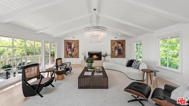 a room with furniture and a large window