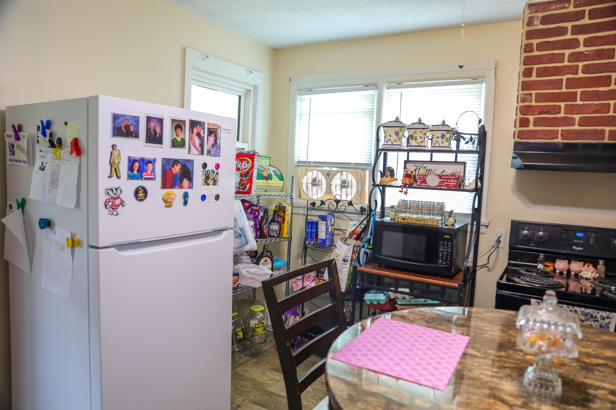 44 Stuart Avenue Stuarts Draft, VA 24477 - Photo 11 of 19 a room with furniture a flat screen tv and a window