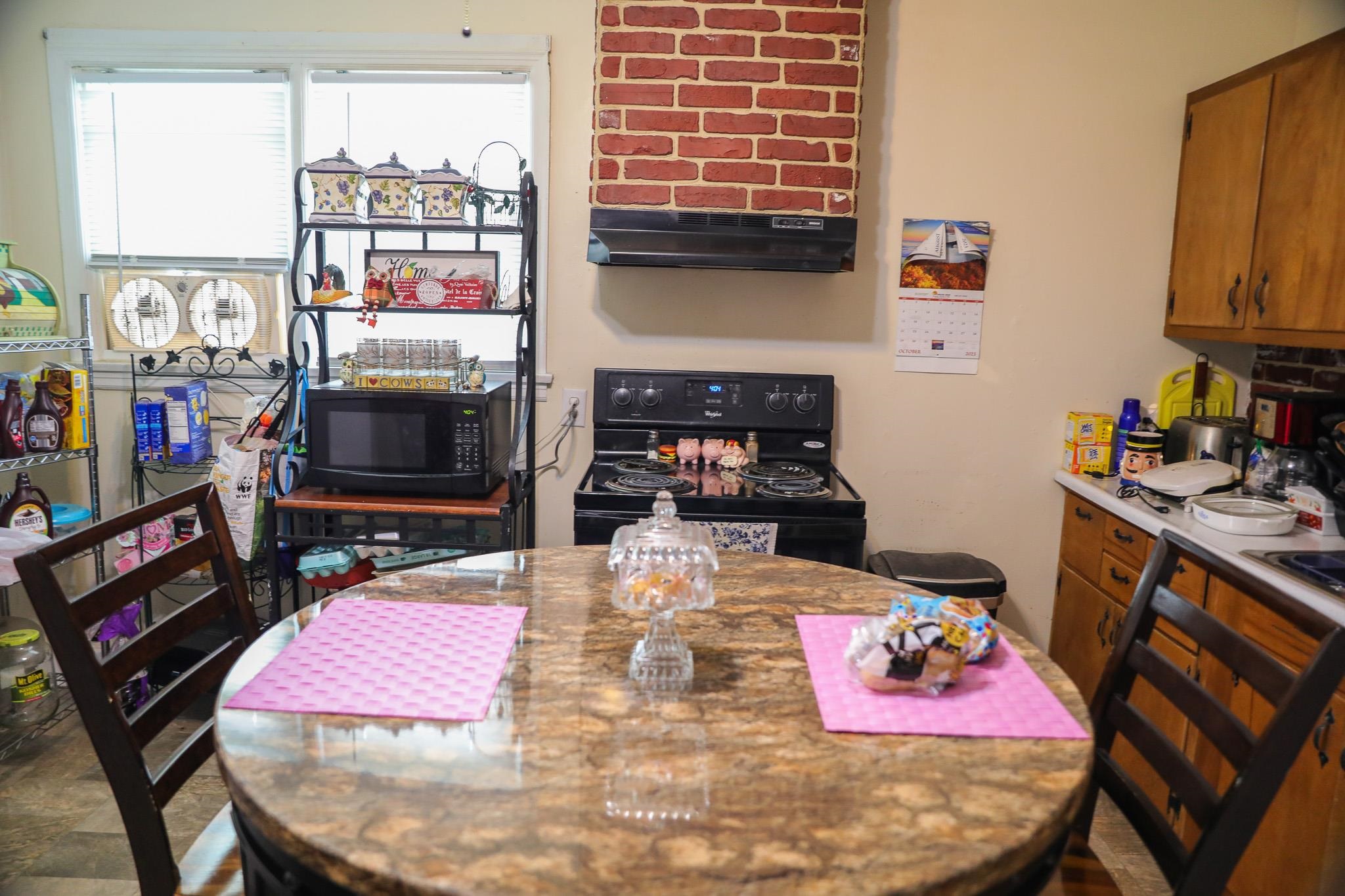 44 Stuart Avenue Stuarts Draft, VA 24477 - Photo 12 of 19 a bath room with furniture and a flat screen tv