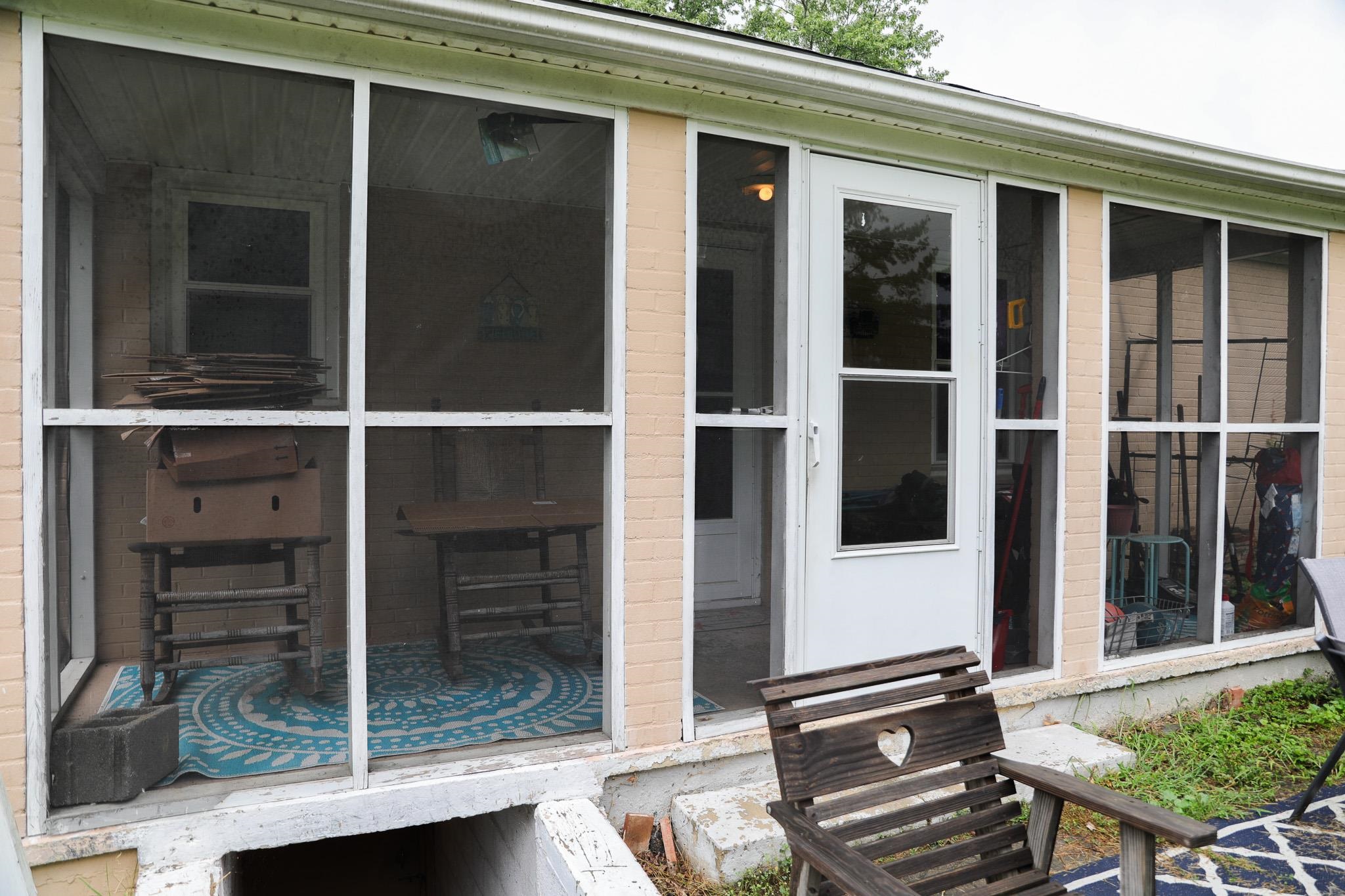 44 Stuart Avenue Stuarts Draft, VA 24477 - Photo 17 of 19 a backyard of a house with seating space