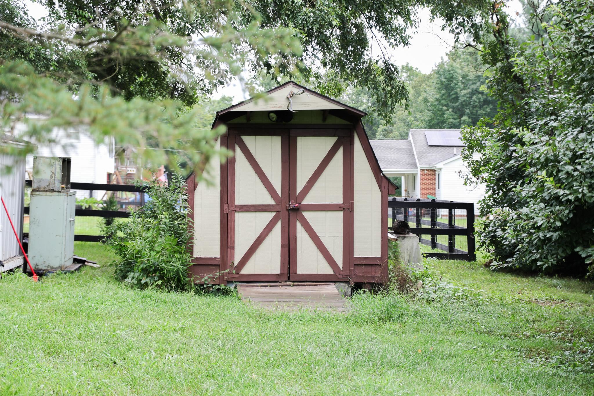 44 Stuart Avenue Stuarts Draft, VA 24477 - Photo 18 of 19 a front view of a house with garden