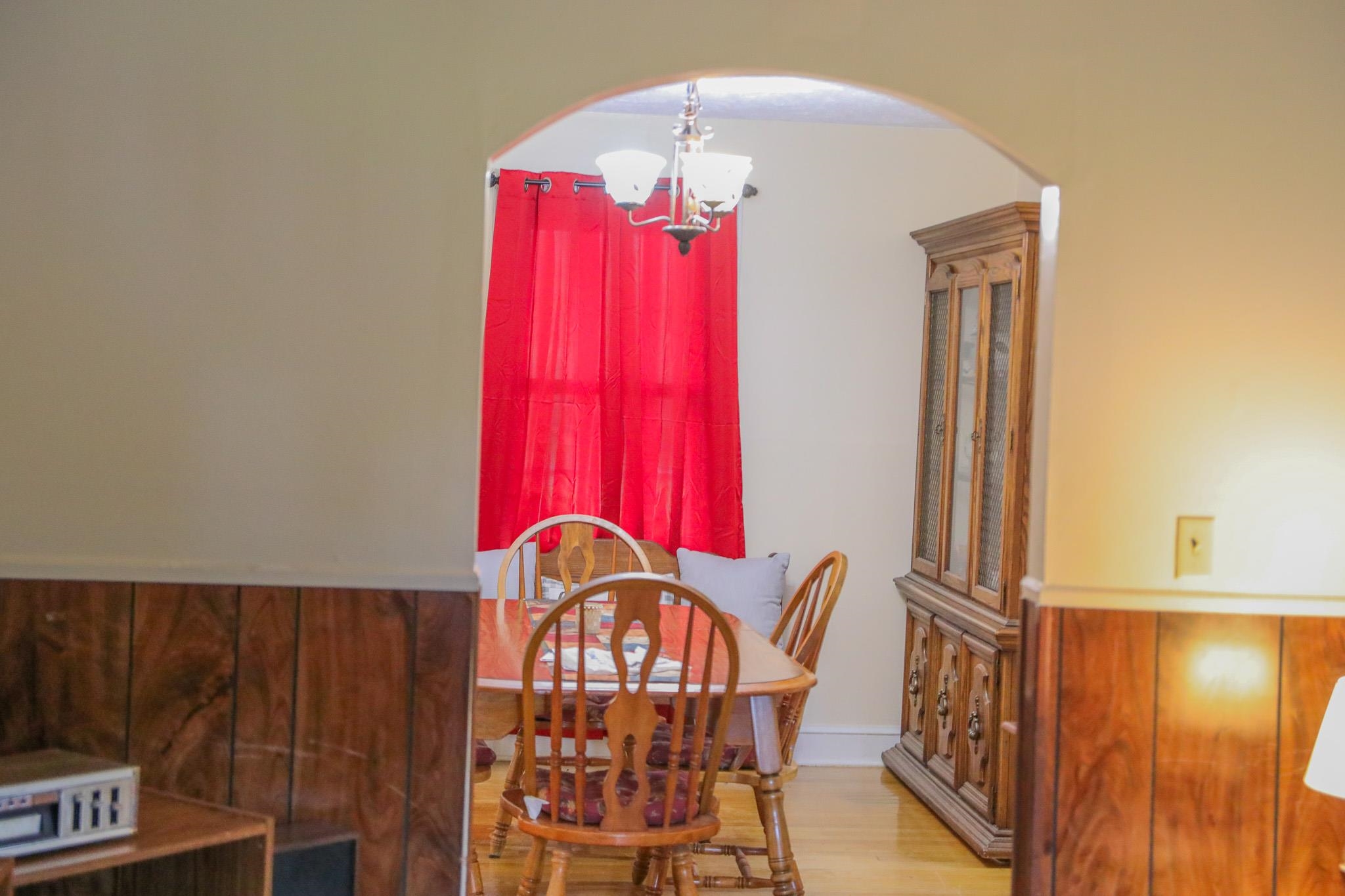 44 Stuart Avenue Stuarts Draft, VA 24477 - Photo 7 of 19 a view of a dining room with furniture and chandelier