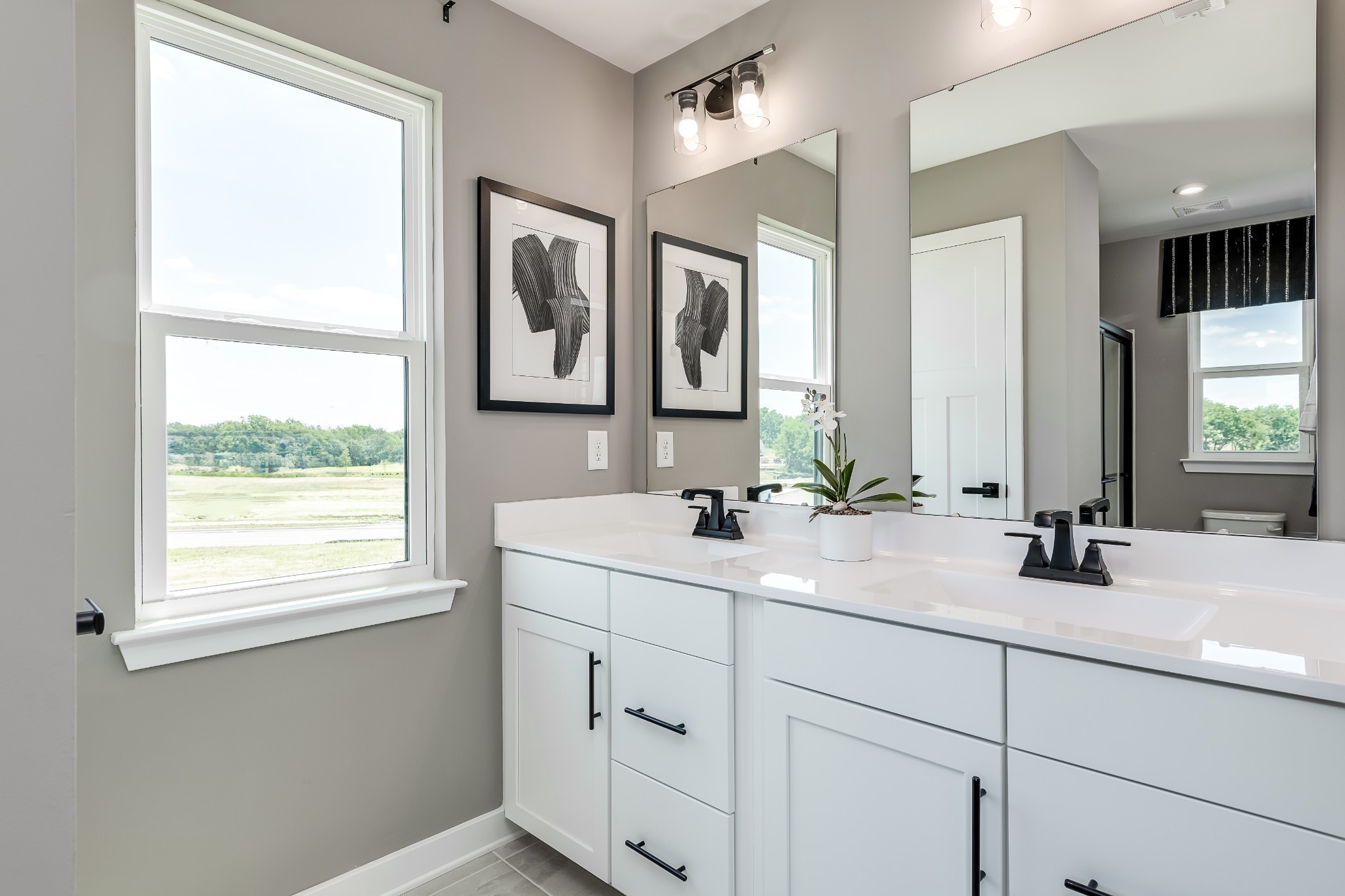 1013 Riverbrook Drive Gallatin, TN 37066 - Photo 19 of 30 a bathroom with 2 sink and a mirror