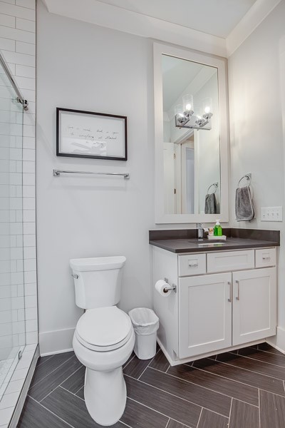 1202 Parkview Circle Nashville, TN 37204 - Photo 12 of 30 a bathroom with a toilet a sink and mirror