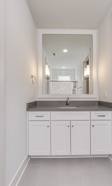 1202 Parkview Circle Nashville, TN 37204 - Photo 19 of 30 a view with granite countertop white cabinets and a sink
