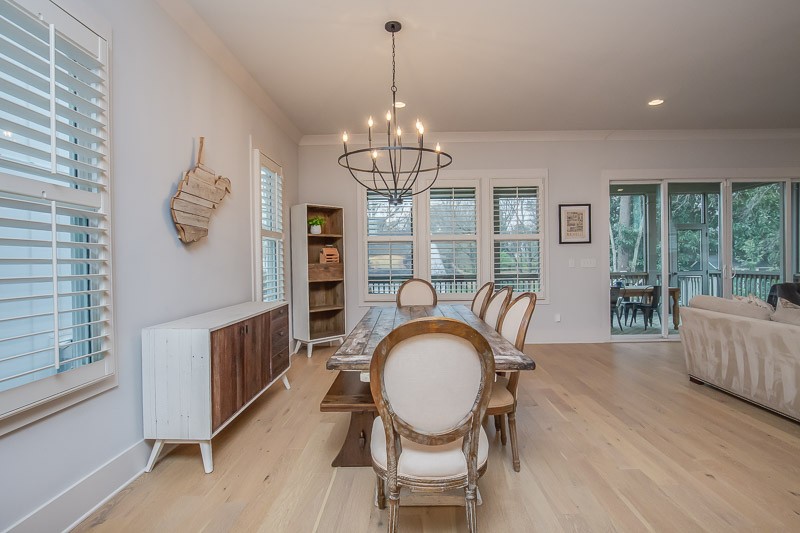 1202 Parkview Circle Nashville, TN 37204 - Photo 7 of 30 a dining room with furniture a chandelier and wooden floor