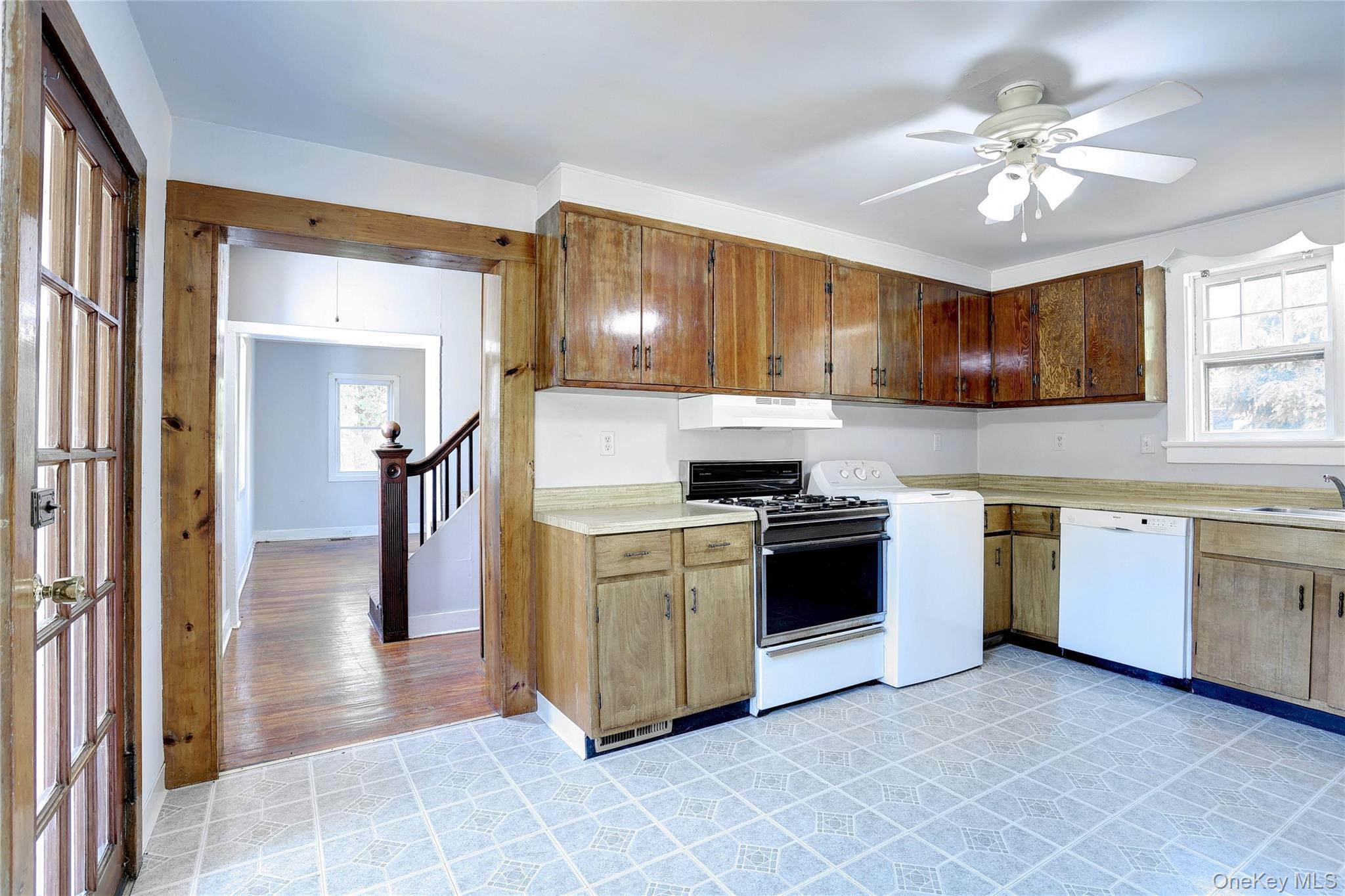 500 Haverstraw Road Suffern, NY 10901 - Photo 14 of 36 a kitchen with stainless steel appliances granite countertop a stove sink and cabinets