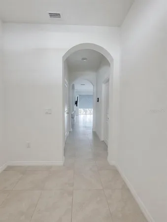 a view of a hallway with closet