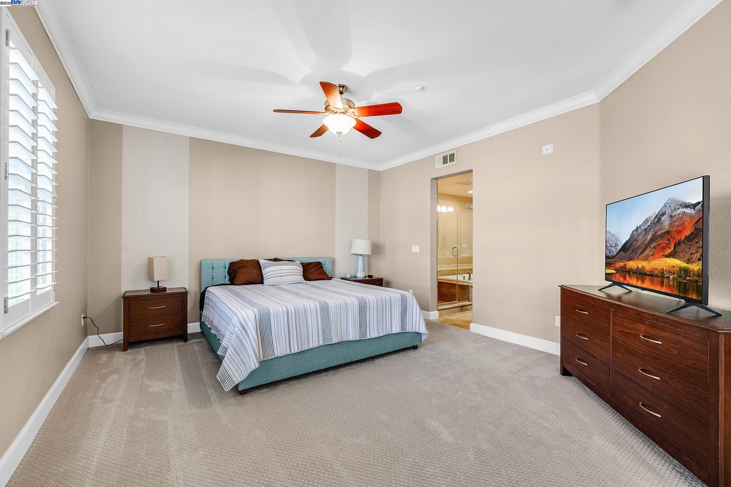 588 Dovecote Lane, Unit 4 Livermore, CA 94551 - Photo 12 of 21 a bedroom with bed and window